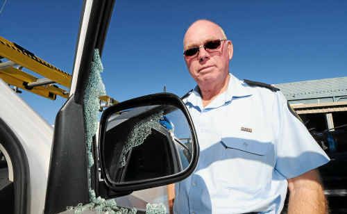 Bob White examines the damage from the break-in at the SES headquarters. ROB WRIGHT Bob White examines the damage from the break-in at the SES headquarters. ROB WRIGHT